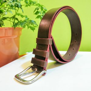Belt - Essential Distressed Classic in Australian Nut S2 Veg Tan Leather with Red Edge and Stitch on 112 Stainless Steel West End Buckle - standing