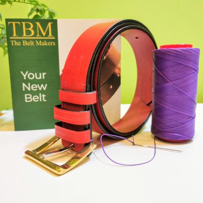 Classic Belt - SFG Red with Dark Purple Edge and Bright Purple Stitch on 112 Brass sst Buxton Buckle - pose