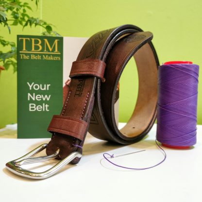Laser Engraved Classic Belt - Bakers OB Australian Nut with Dark Purple Edge and Purple Stitch on 112 Stainless Steel West End Buckle - pose