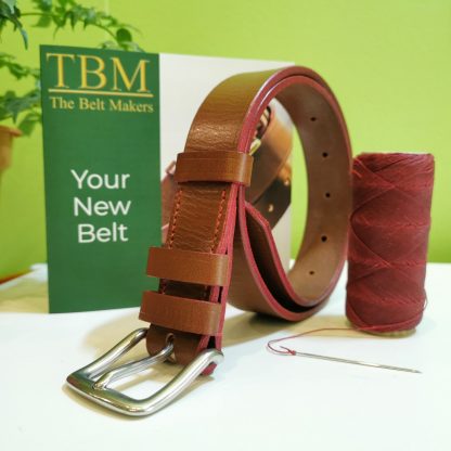 Belt - Essential Distressed Classic in Conker S2 Veg Tan Leather with Red Edge and Stitch on 114 Stainless Steel West End Buckle - pose